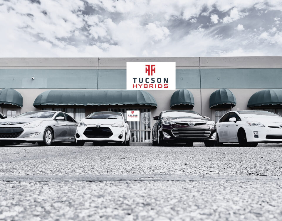 Tucson Hybrids auto repair shop exterior with hybrid vehicles parked outside in Tucson, AZ